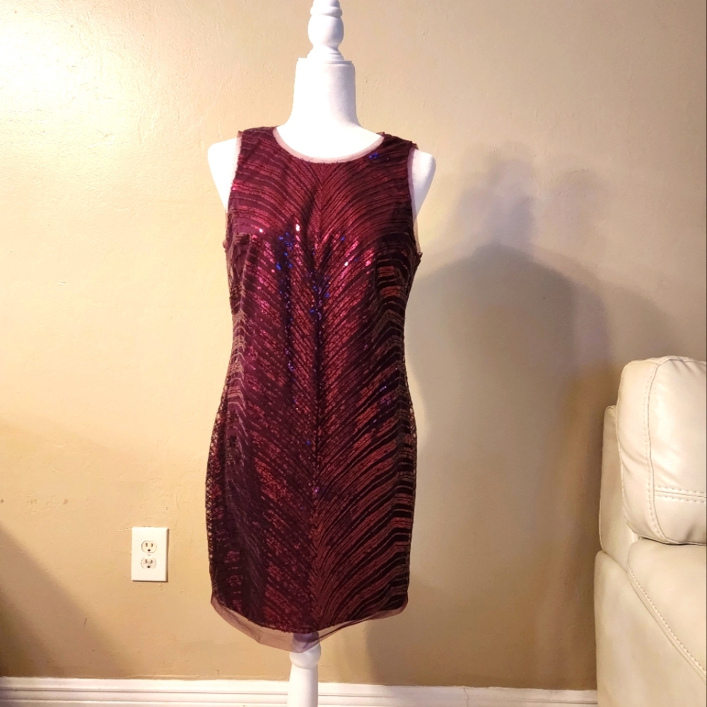 Sleeveless Vince Caputo sequence dress. Silk lined